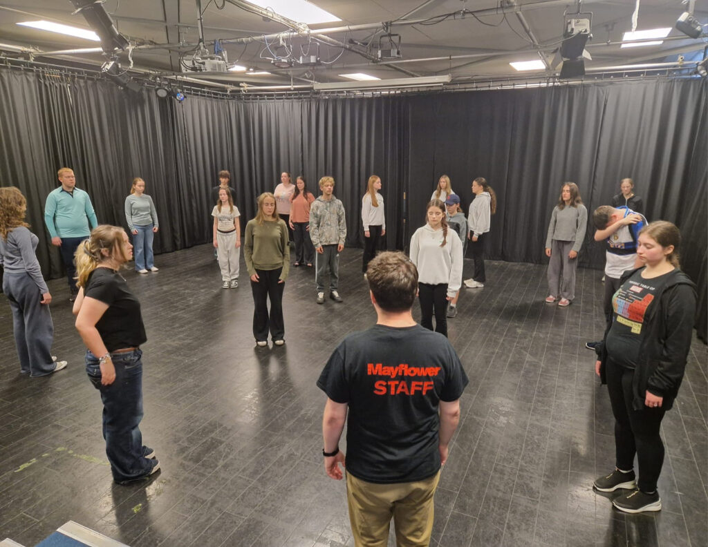 Students practice techniques with a Mayflower MAST Studios.