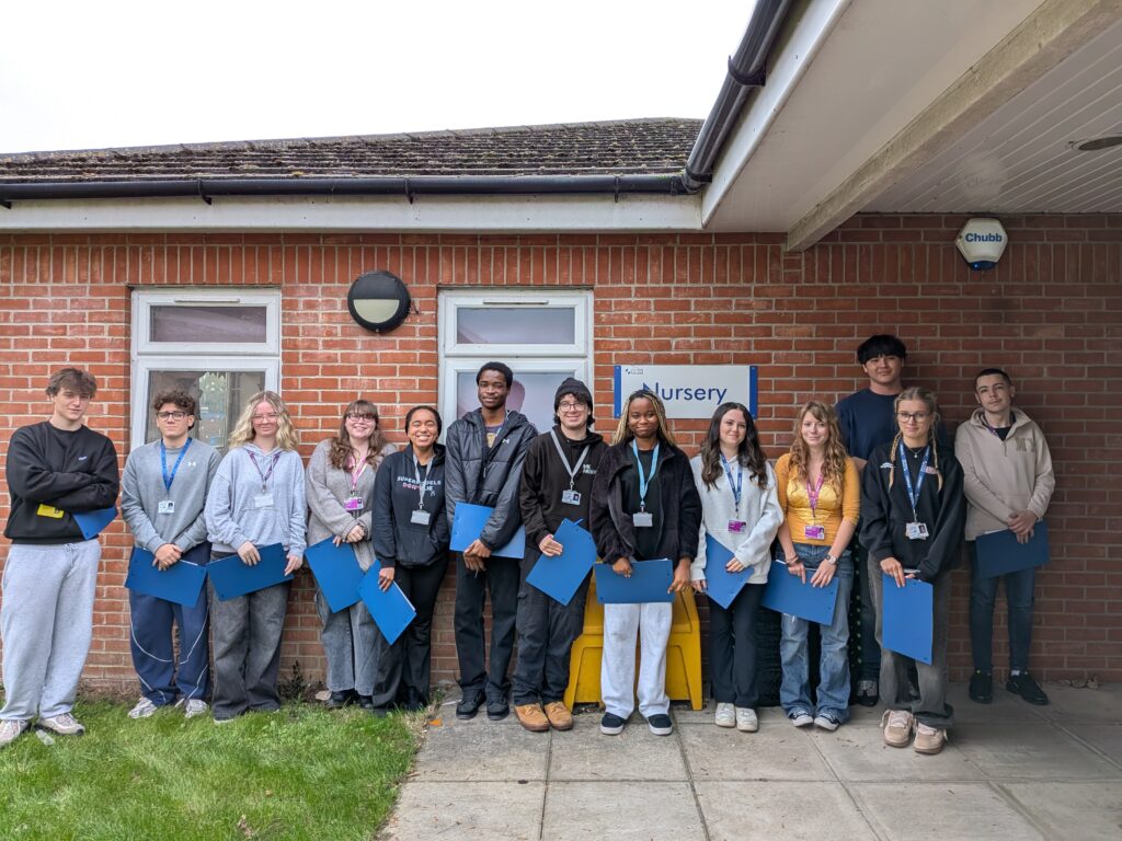 English Language students stand outside the Itchen College Nursery.
